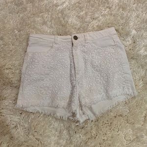 Divided brand white flower embroidered jean shorts